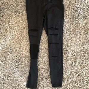 Ripped net leggings
